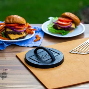 Prensa de parrilla de hierro redonda Lodge